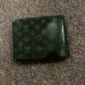 Used Men's black Louis Vuitton wallet.